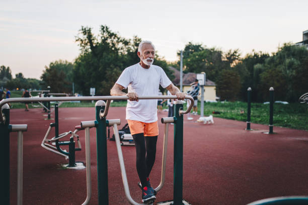 istock Bearded senior man exercising at a park 1076200016
