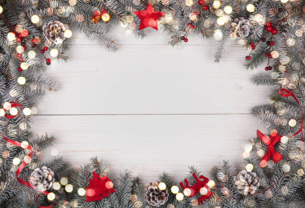 istock Christmas background on the white wooden desk. Top viev with copy space 1076201364