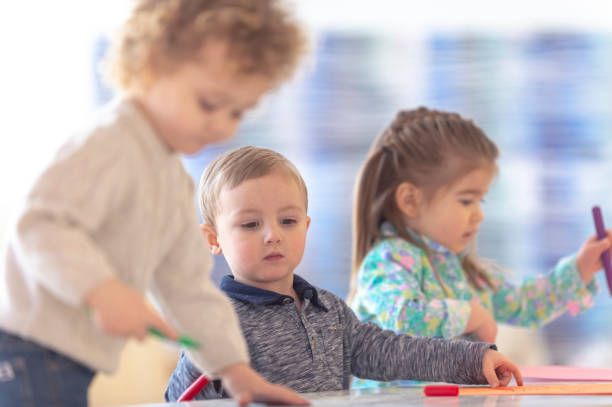 istock Toddlers playing in preschool 1076204482