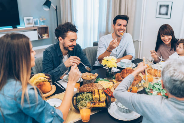 istock Happy family celebrating Thanksgiving day 1076224758