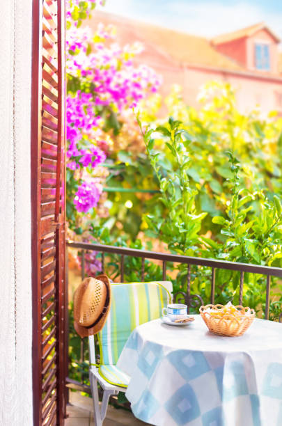 istock breakfast on balcony with garden view on sunny summer morning 1076238390