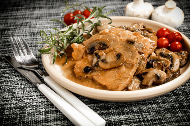 istock Braised pork chop with mushrooms. 1076239632