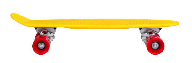 istock Yellow cruiser penny plastboard with red wheels 1076249490