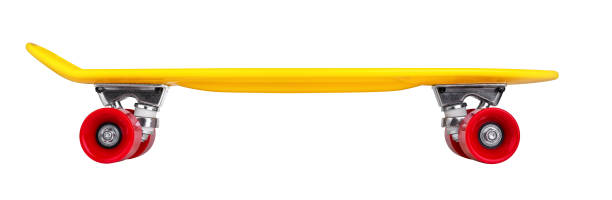 istock Yellow cruiser penny plastboard with red wheels 1076249502