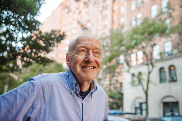 istock Smiling Senior Man Outdoors in New York City 1076257784