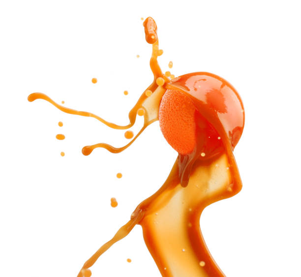 istock orange in juice splash isolated on a white background 1076263522