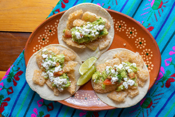 istock Chicharron tacos with guacamole 1076267148