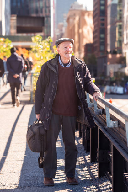 istock Senior Man Enjoying the High Line Park in NYC 1076274788