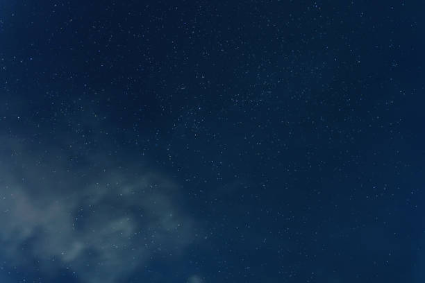 istock Night sky backgrounds with stars and clouds 1076274972
