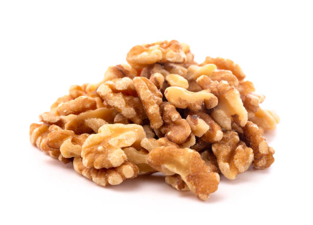 istock A Pile of Healthy Walnuts on a White Background 1076277710