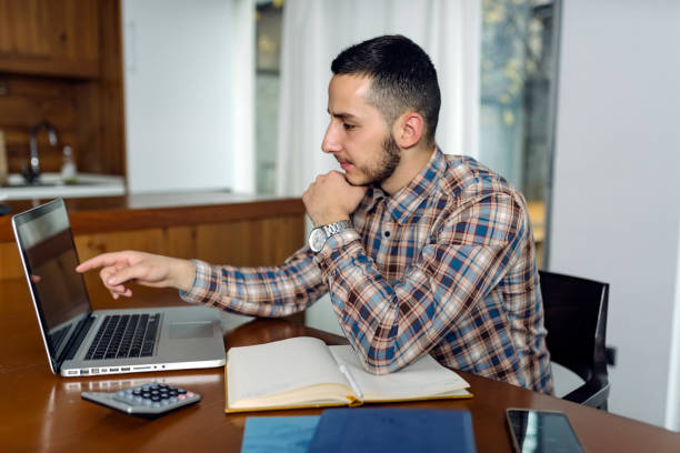 istock Handsome Young Businessman in the Office 1076296032