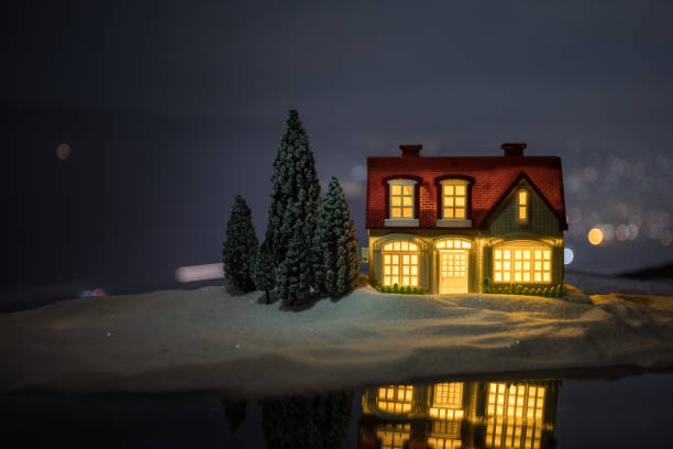 istock wooden house in winter forest at night 1076299898