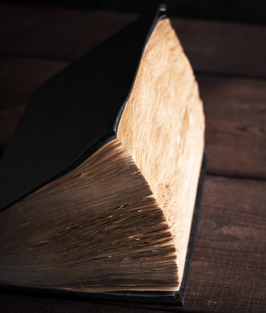 istock very old book with yellow pages 1076304652