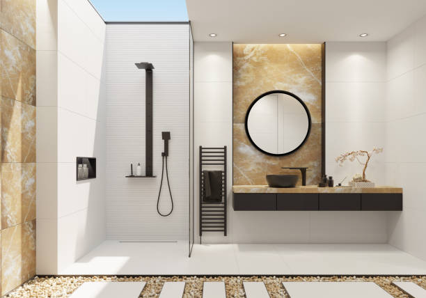 роскошная белая ванная комната с золотым ониксом и смелыми черными деталями - bathroom black faucet стоковые фото и изображения