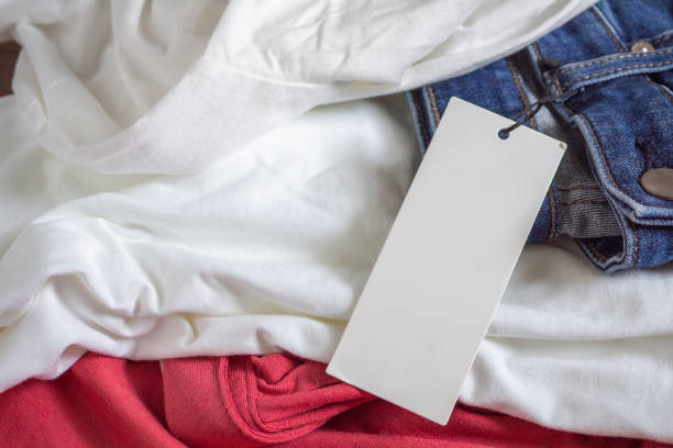 istock Blank price tag label on white t-shirt 1076326722