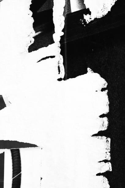 istock Blank white black old ripped torn paper crumpled creased posters grunge textures backdrop backgrounds placard 1076334442