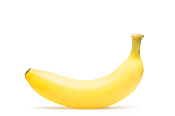 istock A banana stands alone on a white background 1076384014