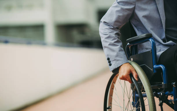 istock Disable businessman on the wheelchair return to work again. 1076387926