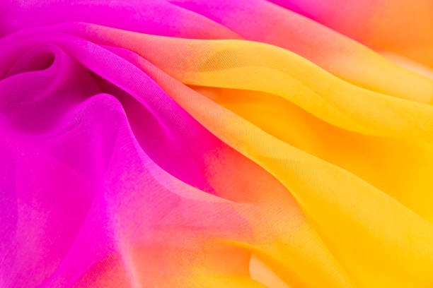 istock Texture chiffon fabric pink and yellow  color for backgrounds 1076390526