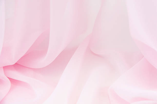 istock Texture chiffon fabric pink color for backgrounds 1076390742