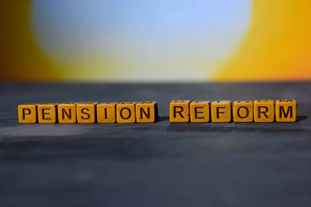 istock Pension reform on wooden blocks. 1076406736