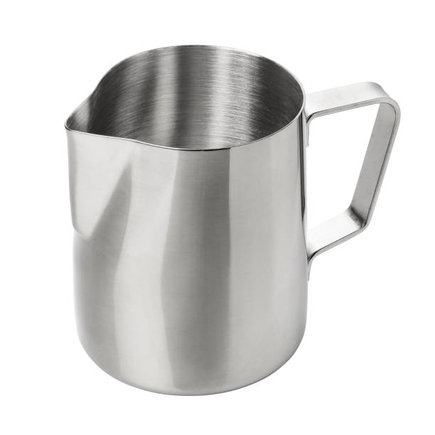 istock Stainless steel milk pitcher jug isolated 1076406794