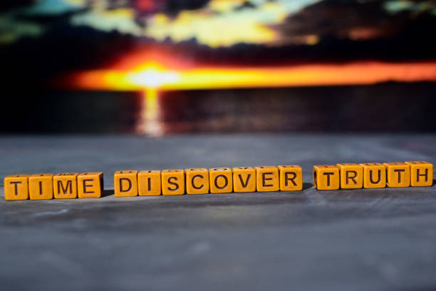 istock Time discovery truth on wooden blocks. 1076409346