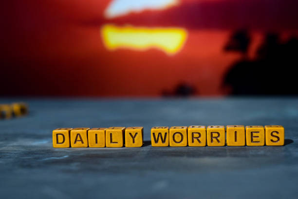 istock Daily worries on wooden blocks. 1076409764