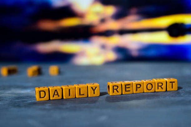 istock Daily report on wooden blocks. 1076409858