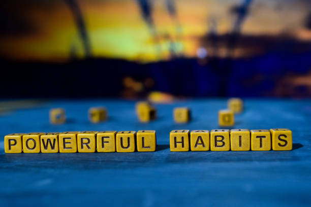 istock Powerful habits on wooden blocks 1076410008