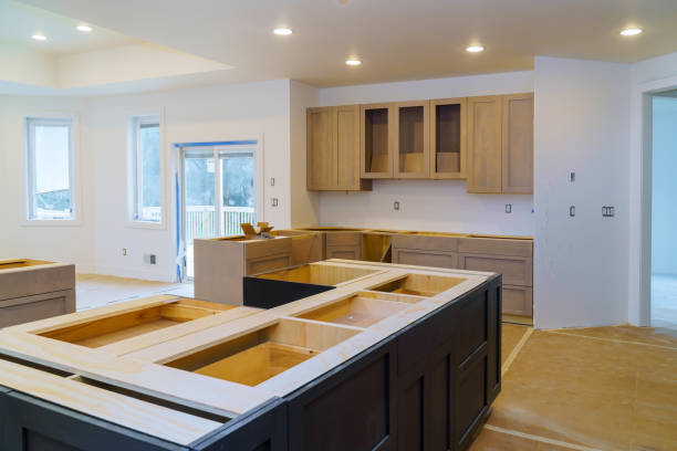 istock Installing new induction kitchen kitchen Installation of kitchen cabinet. 1076414534