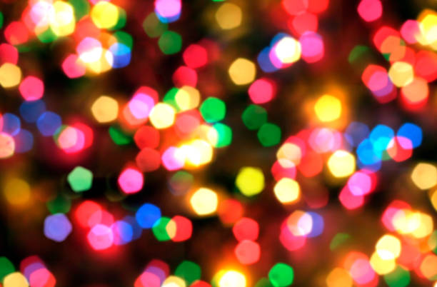 istock Rainbow bright blurred bokeh background, holiday, fun, disco, Christmas, party, new year, lights, light spots 1076421548