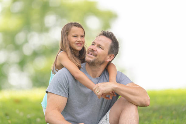 istock Girl and her dad outside 1076422172