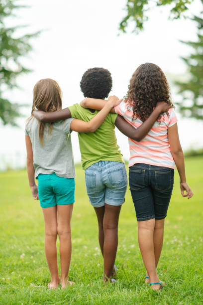 istock Three kids at the park 1076425026