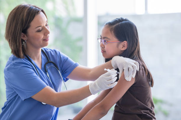 istock Girl at medical appointment 1076428654