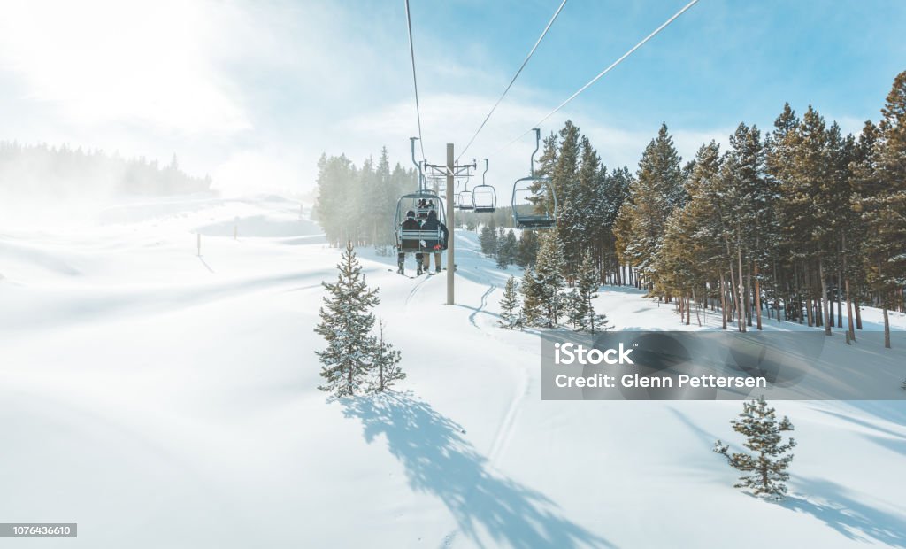Scenic view of Breckenridge ski resort , Colorado. Breckenridge, United States - December 2, 2018: View of untracked ski slope and ski lift in Breckenridge ski resort. Colorado Stock Photo