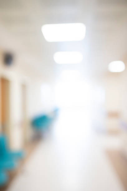istock Abstract blur hospital corridor defocused Medical background 1076438832