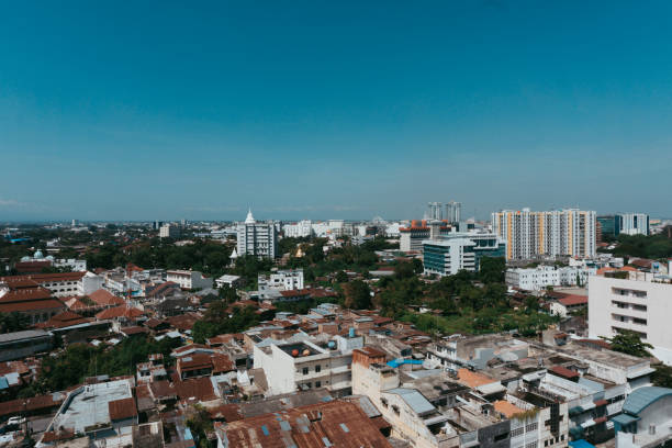 istock Medan skyline city during sunny day 1076460518