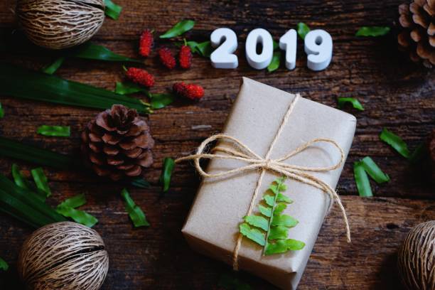 istock 2019 eco friendly brown wrap gift boxes, vintage new year gift concept 1076467576