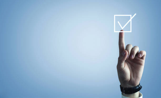 istock Man hand touching in checkbox. Business concept 1076473860
