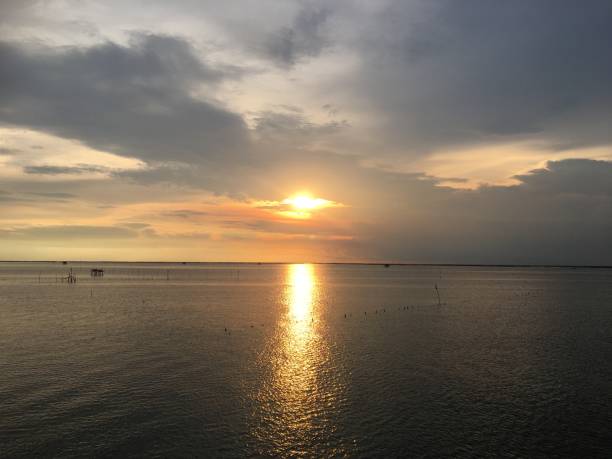 istock Sky and sea in the evening. Sunset reflection on the sea. Soft focus background. 1076480204
