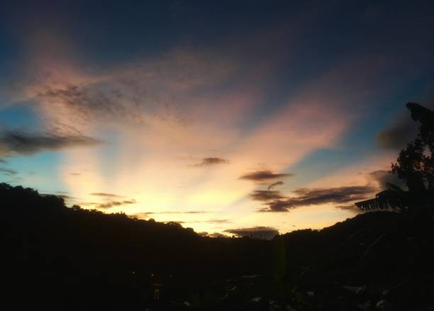 istock Ray of sunlight after mountain in the evening. 1076480336