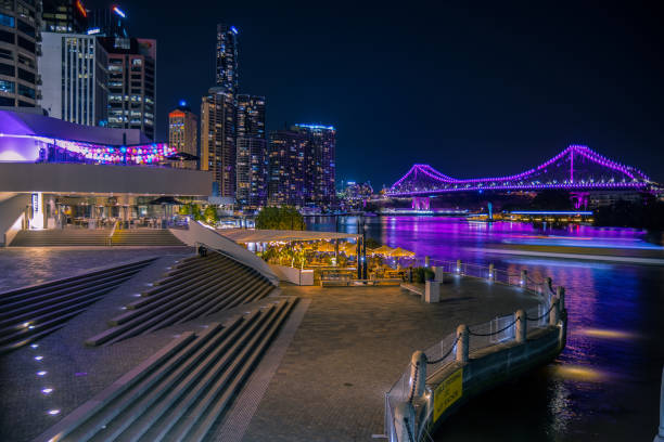 istock Modern city embankment in night time 1076480664