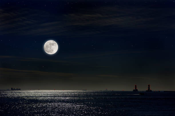 istock Full moon rising over the Tokyo bay. 1076481088