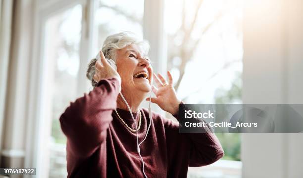 Turn Up The Volume Of Life Stock Photo - Download Image Now - Senior Adult, Music, Listening
