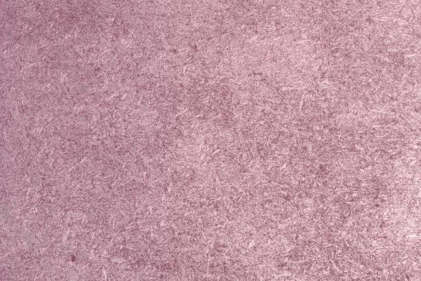istock vintage red metallic painted chipboard texture - cute abstract photo background 1076487464