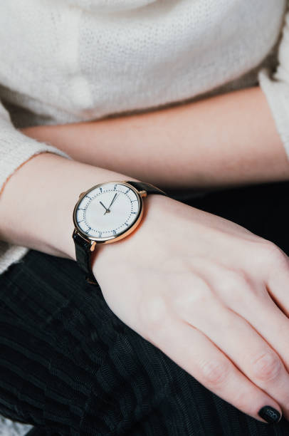 istock Wristwatches on women's hand 1076496794
