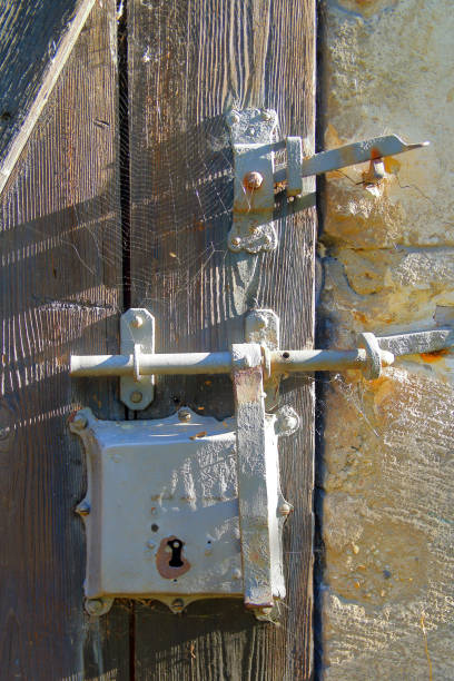 old locks on the barn door. - metal rusty rust steel imagens e fotografias de stock