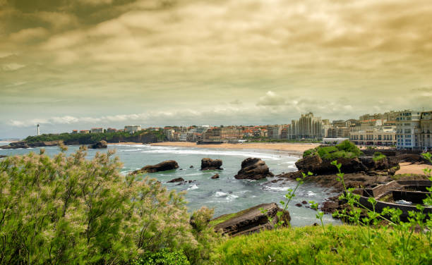 istock view of Biarritz beach under cloudy sky 1076500450