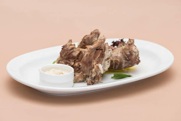istock Turkey necks,  served with horseradish puree,  placed on white plate,  light background,  isolated 1076502614